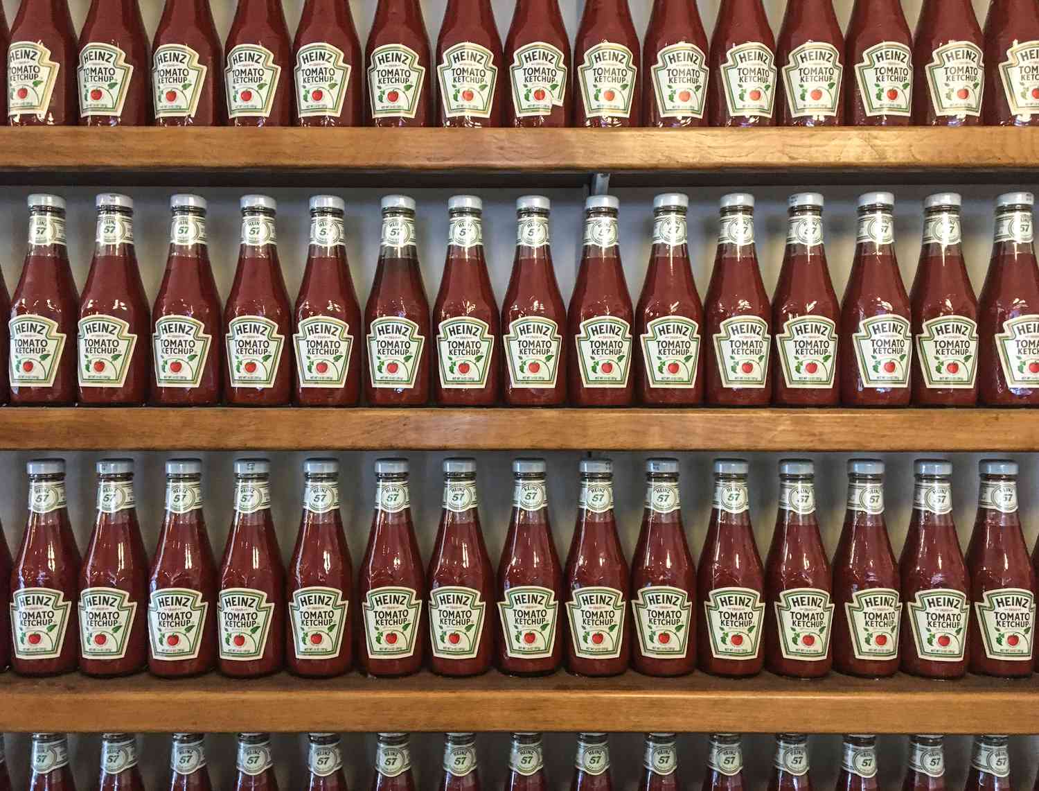 row of Heinz ketchup on a shelf