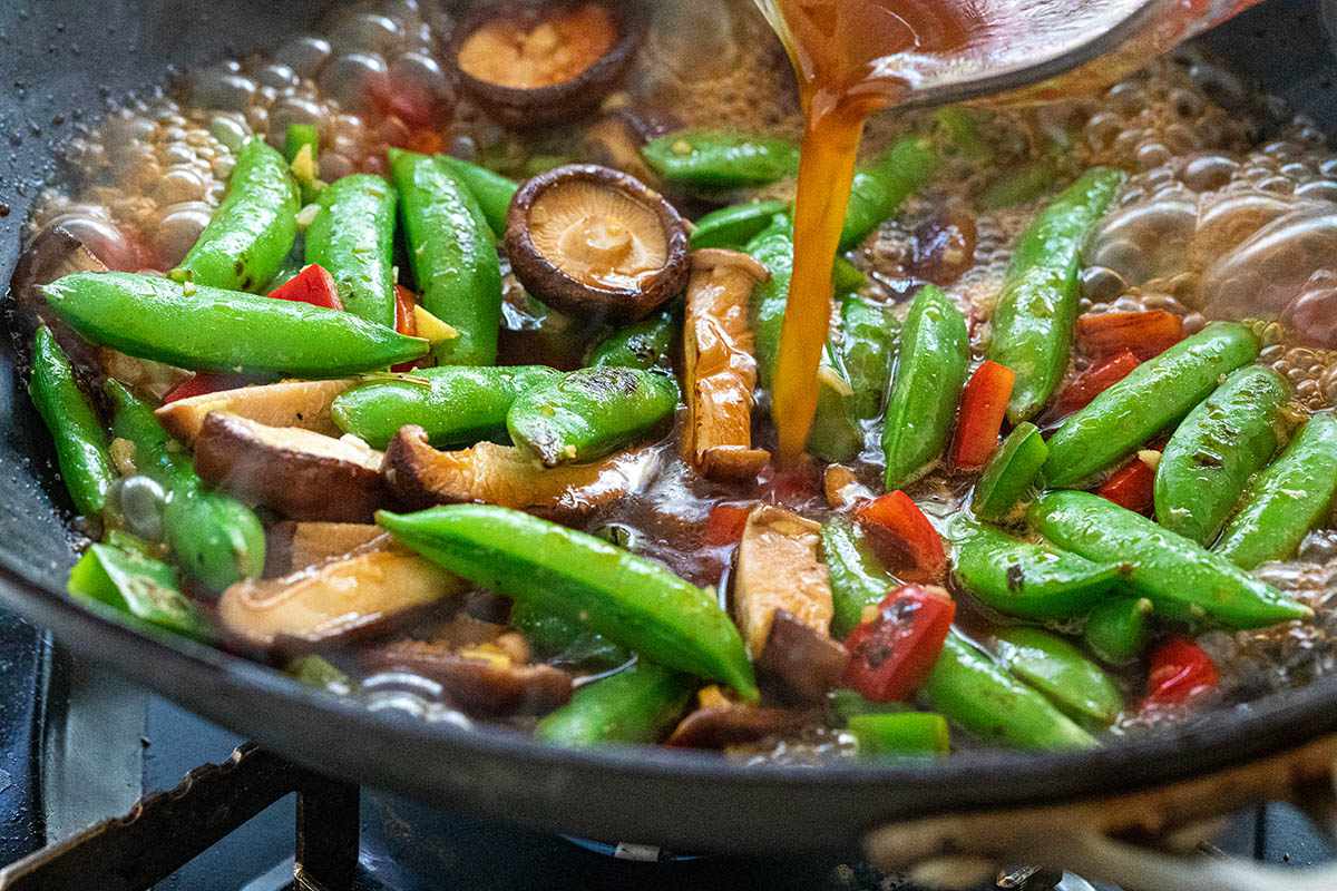 Stir fried vegetables with sauce poured on top to make a One Pot Vegetarian Stir Fry.