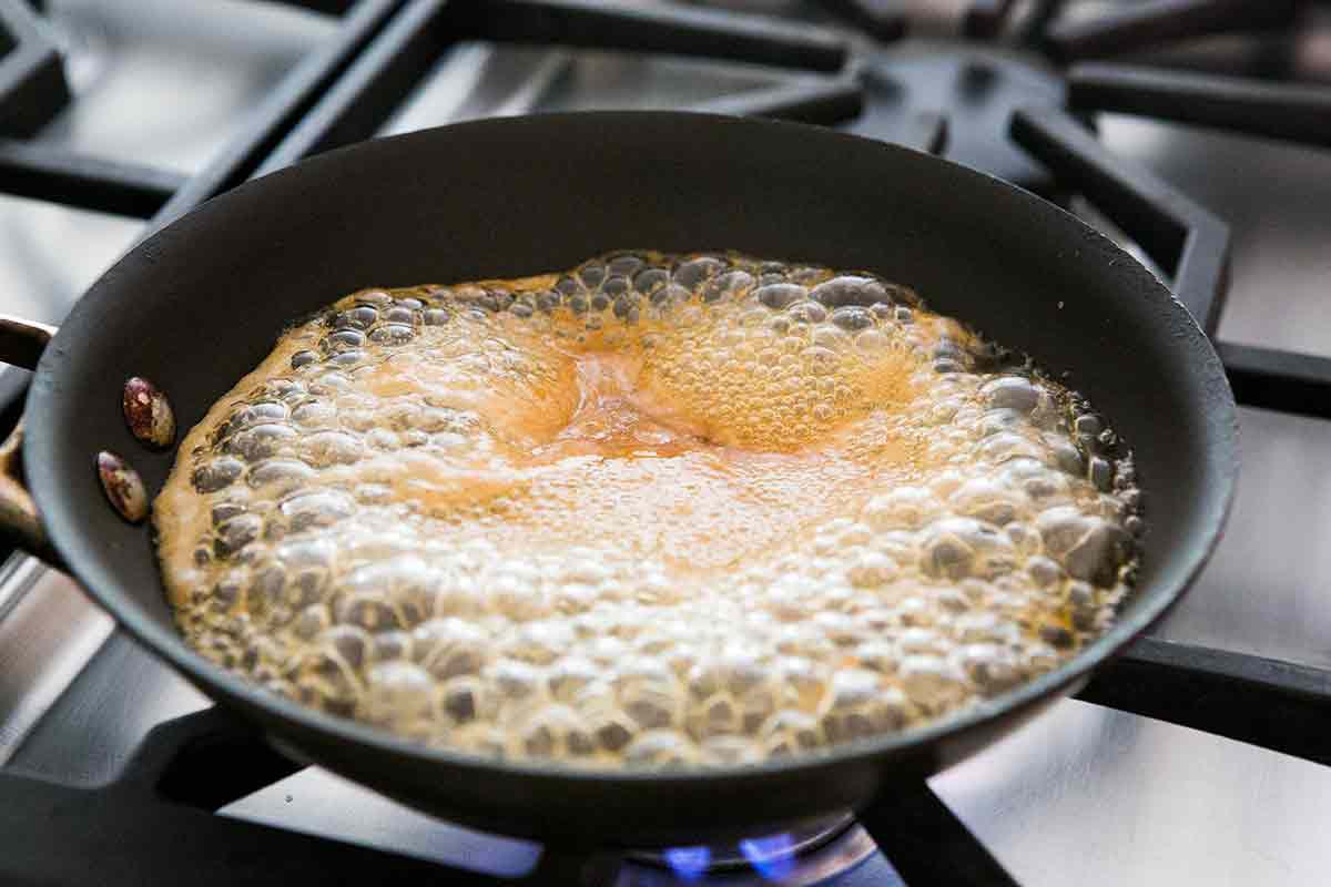 Making glaze for honey glazed salmon