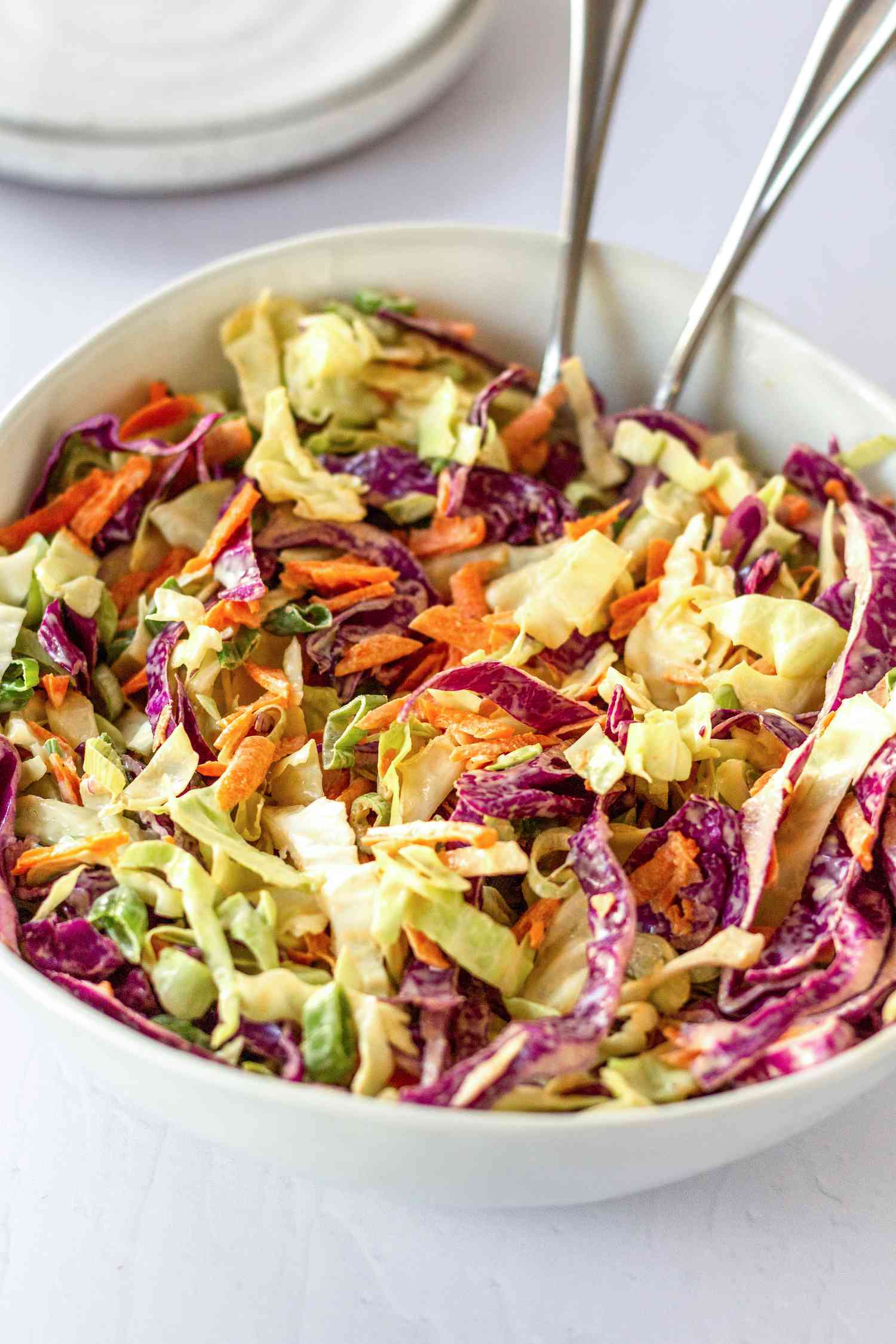 Bright Classic Coleslaw in a white bowl.