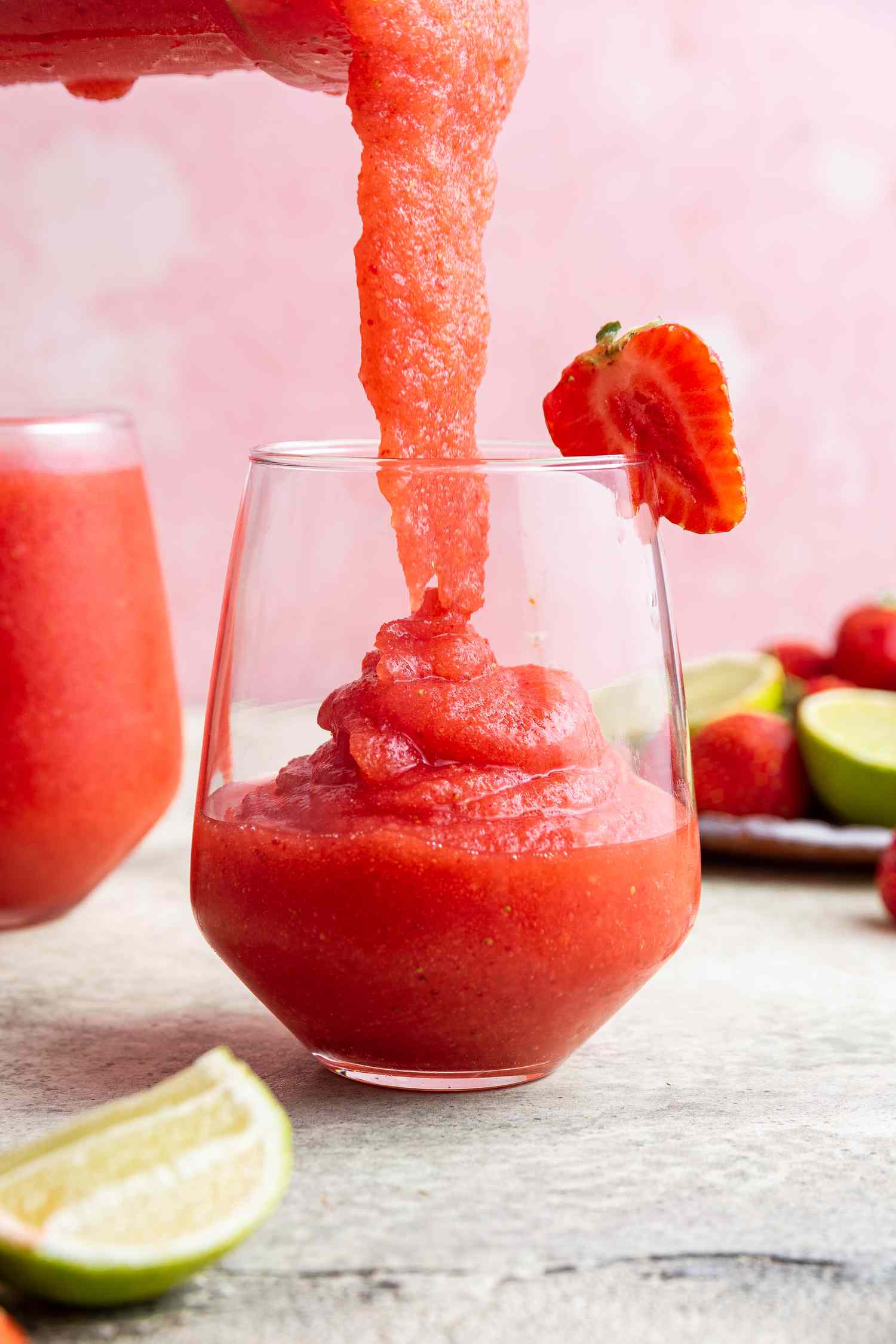 Frozen Strawberry Daiquiri Poured into a Stemless Wine Glass
