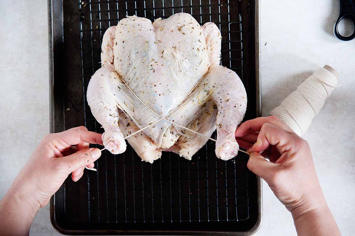 How to Brine a Chicken - trussing a whole chicken