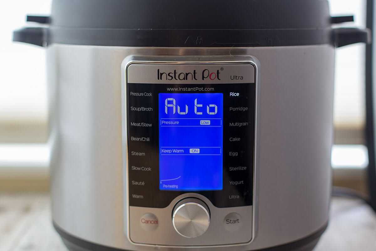 An instant pot cooker resting on a counter top 