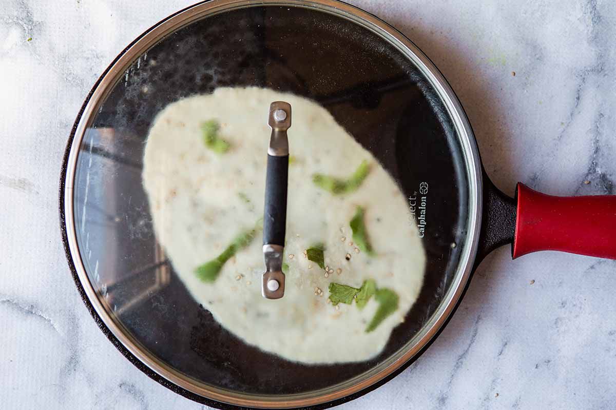 Flatbread Recipe - dough under lid on skillet