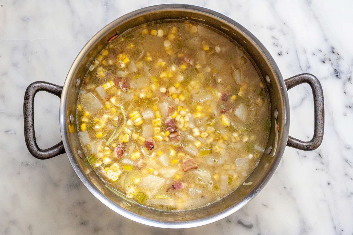 Corn Added to Pot of Crab Chowder