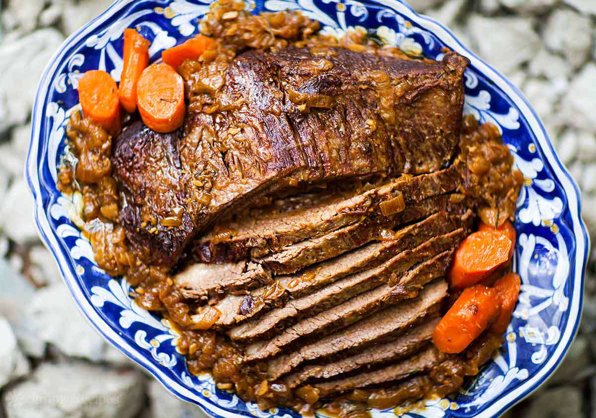 Beef Brisket recipe with carrots on platter