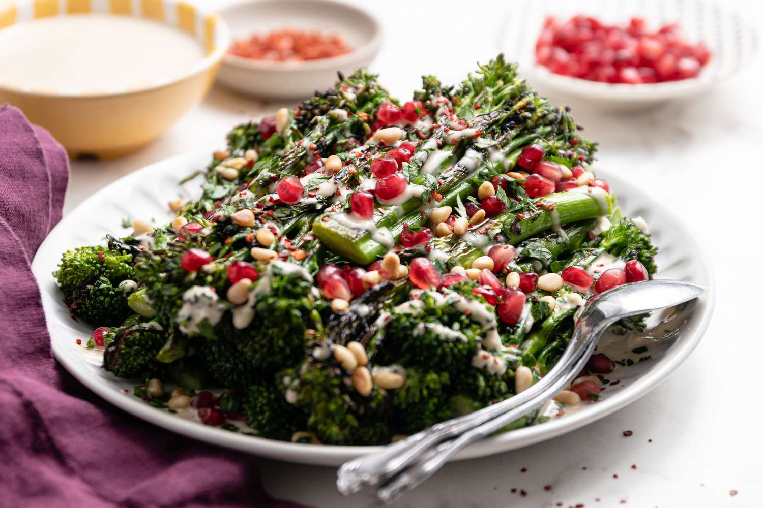 Grilled Broccolini with Lemon Tahini Dressing and Pomegranate Arils