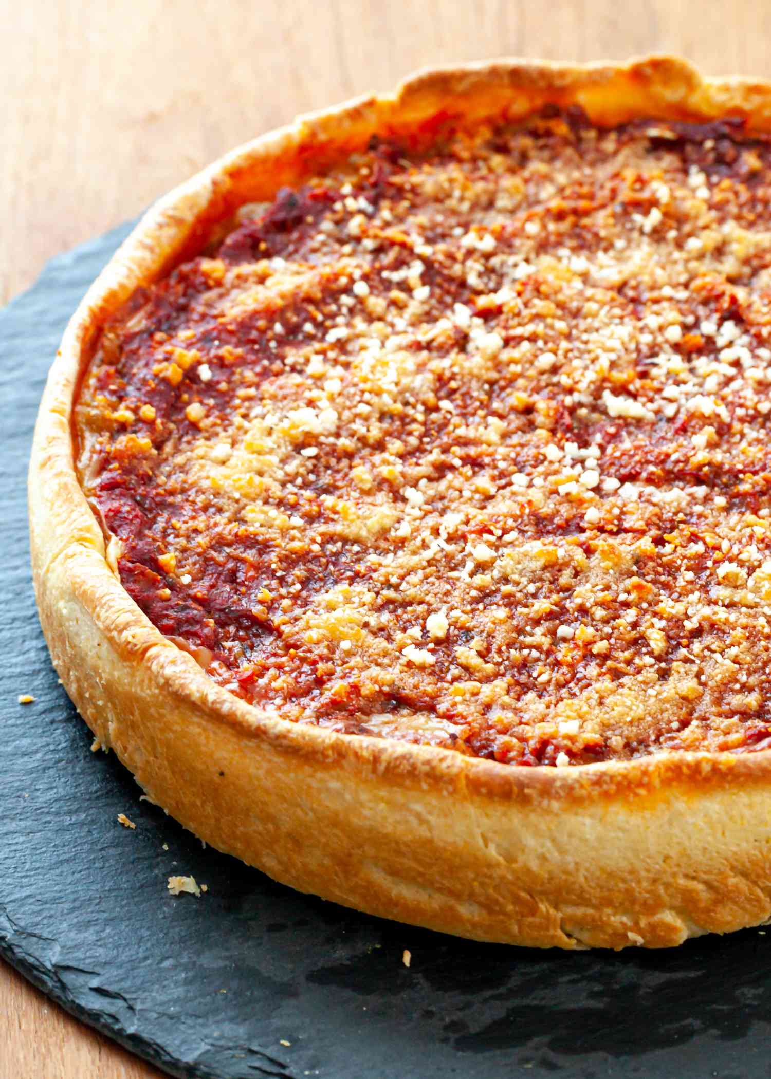 Italian Sausage Deep Dish Pizza set on a table.