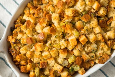 A white baking dish with stuffing