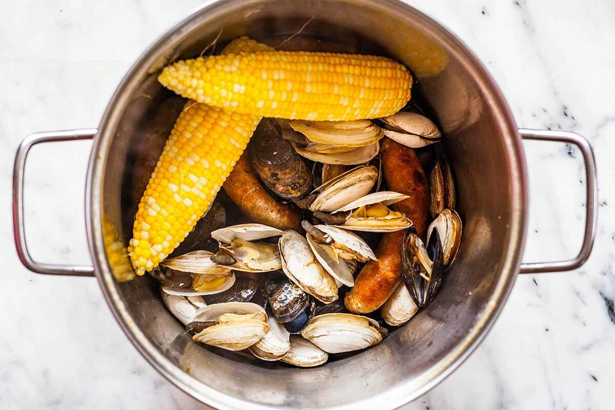 New England clambake add the remaining ingredients