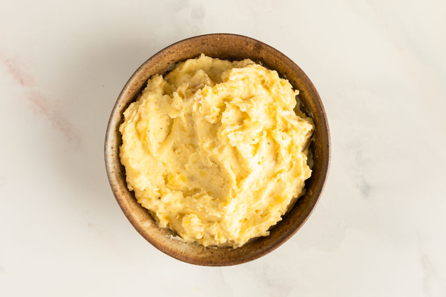 Garlic mashed potatoes in a serving bowl