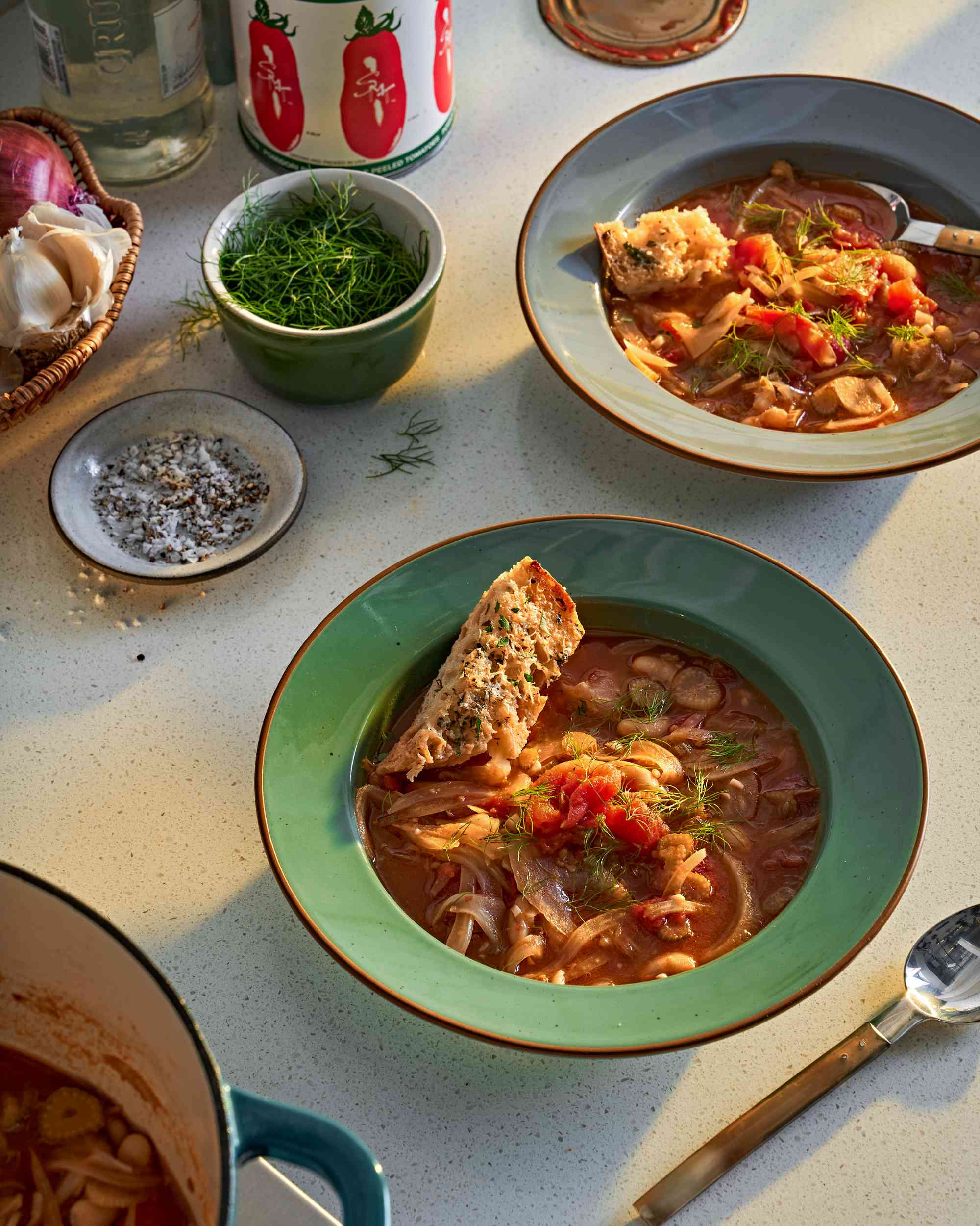 Two bowls of tomato, white bean, and fennel soup