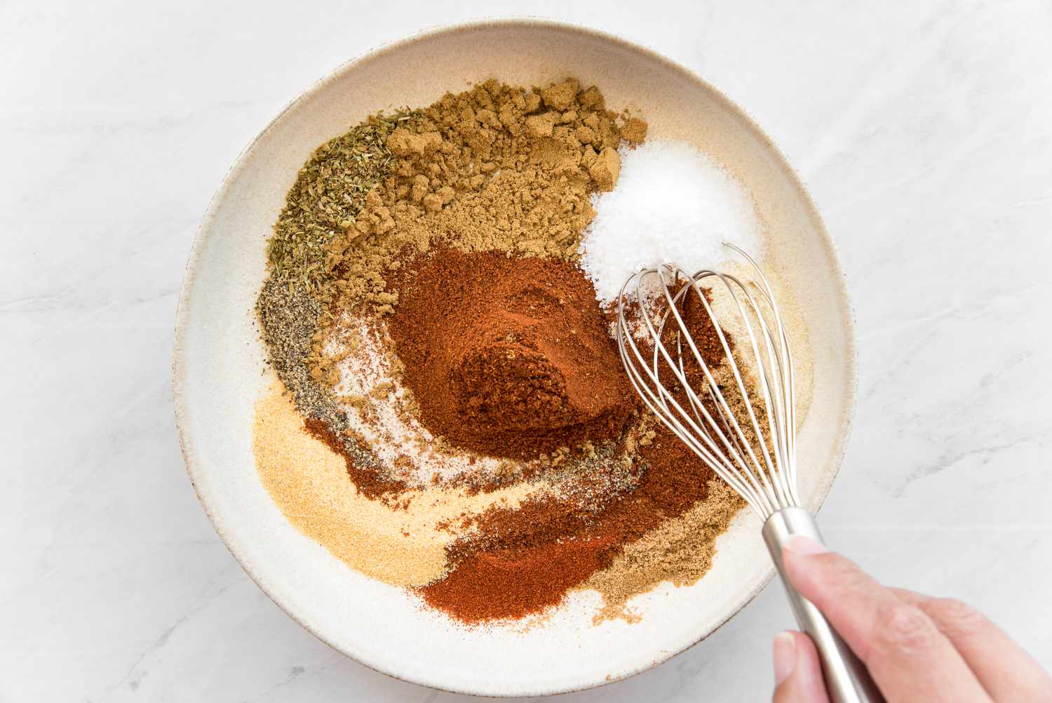 Mix Spices for Taco Seasoning Using a Whisk 