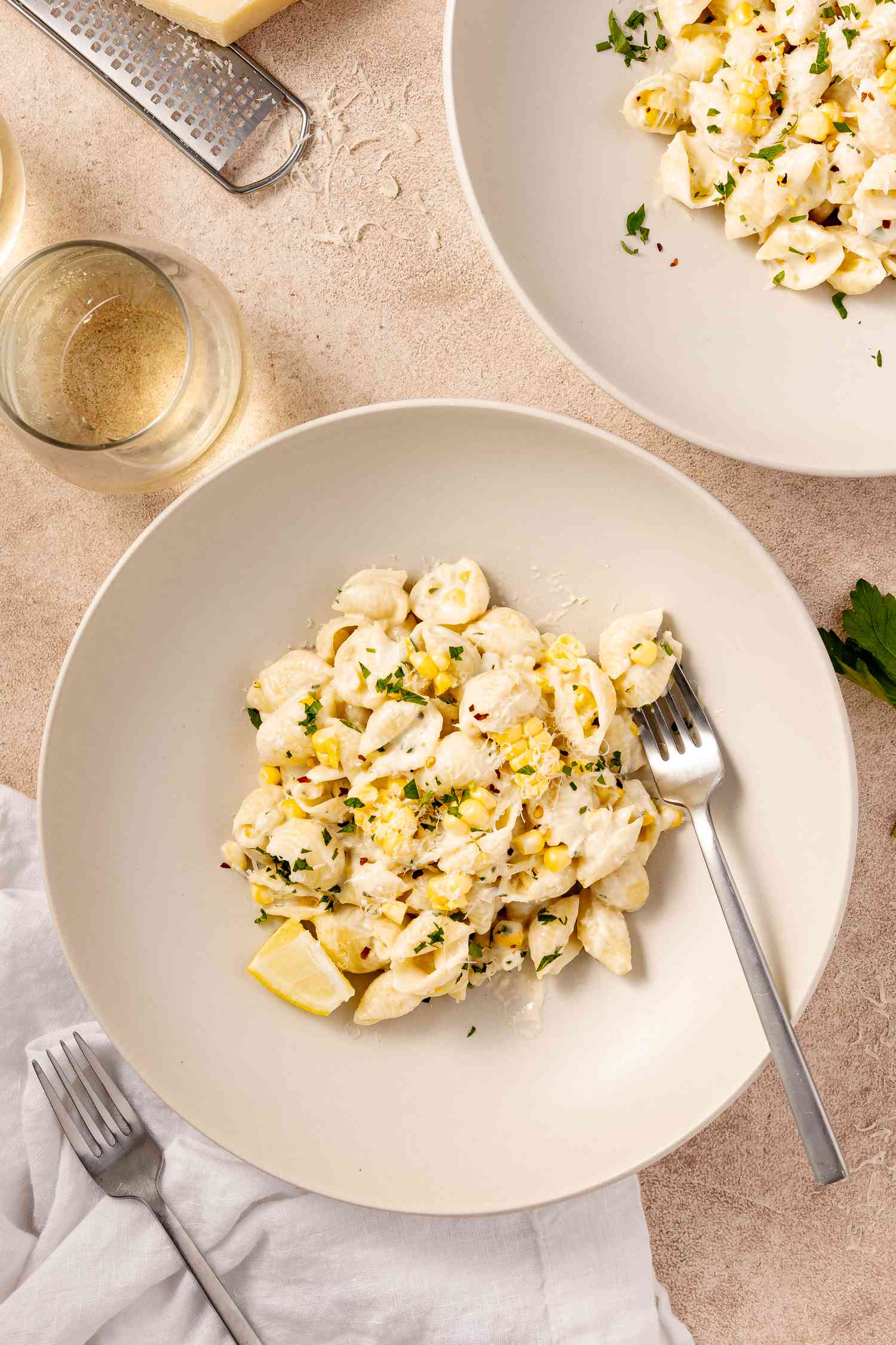 Bowls of Fresh Corn Pasta with a Fork