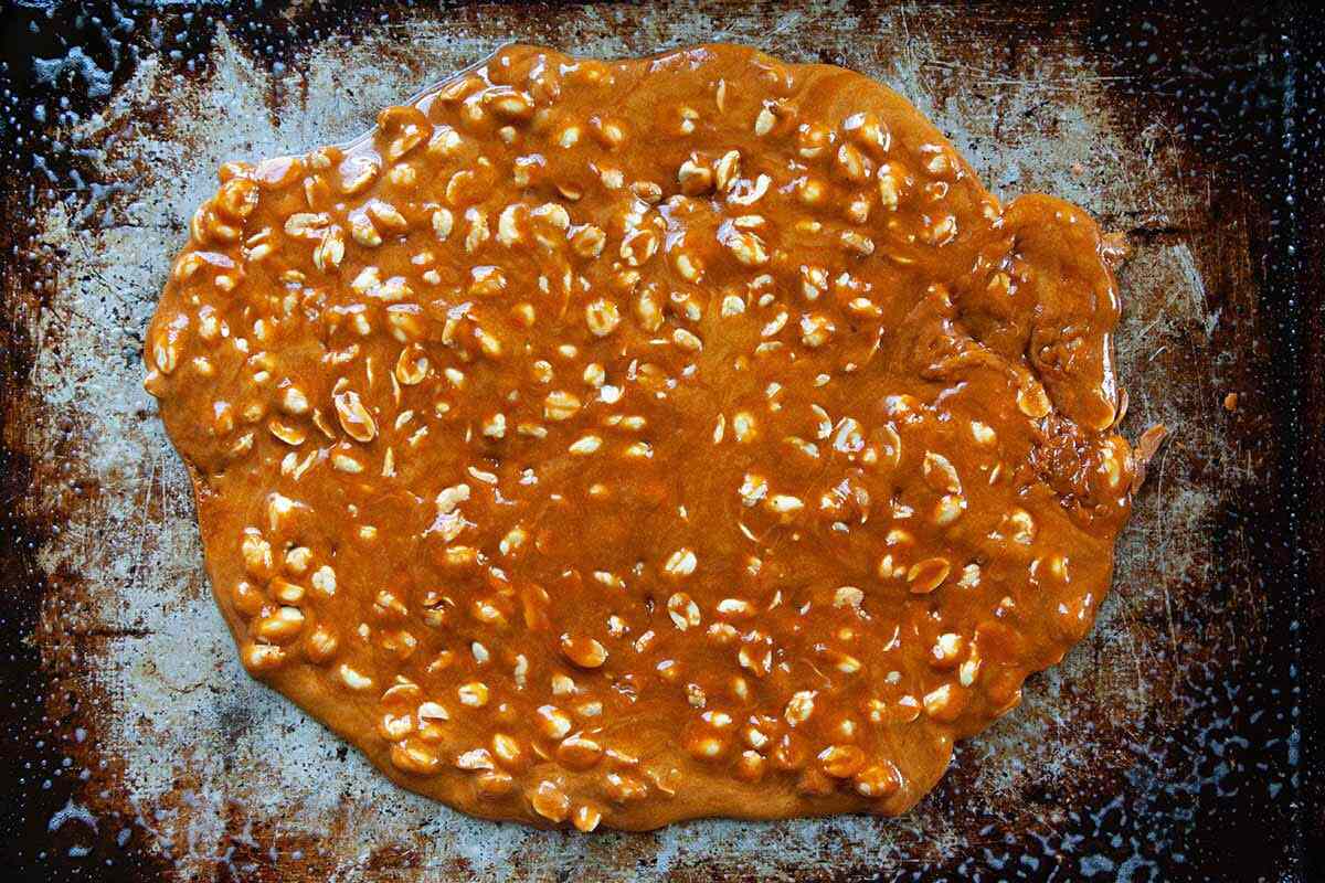 How to Make Peanut Brittle cover the baking sheet