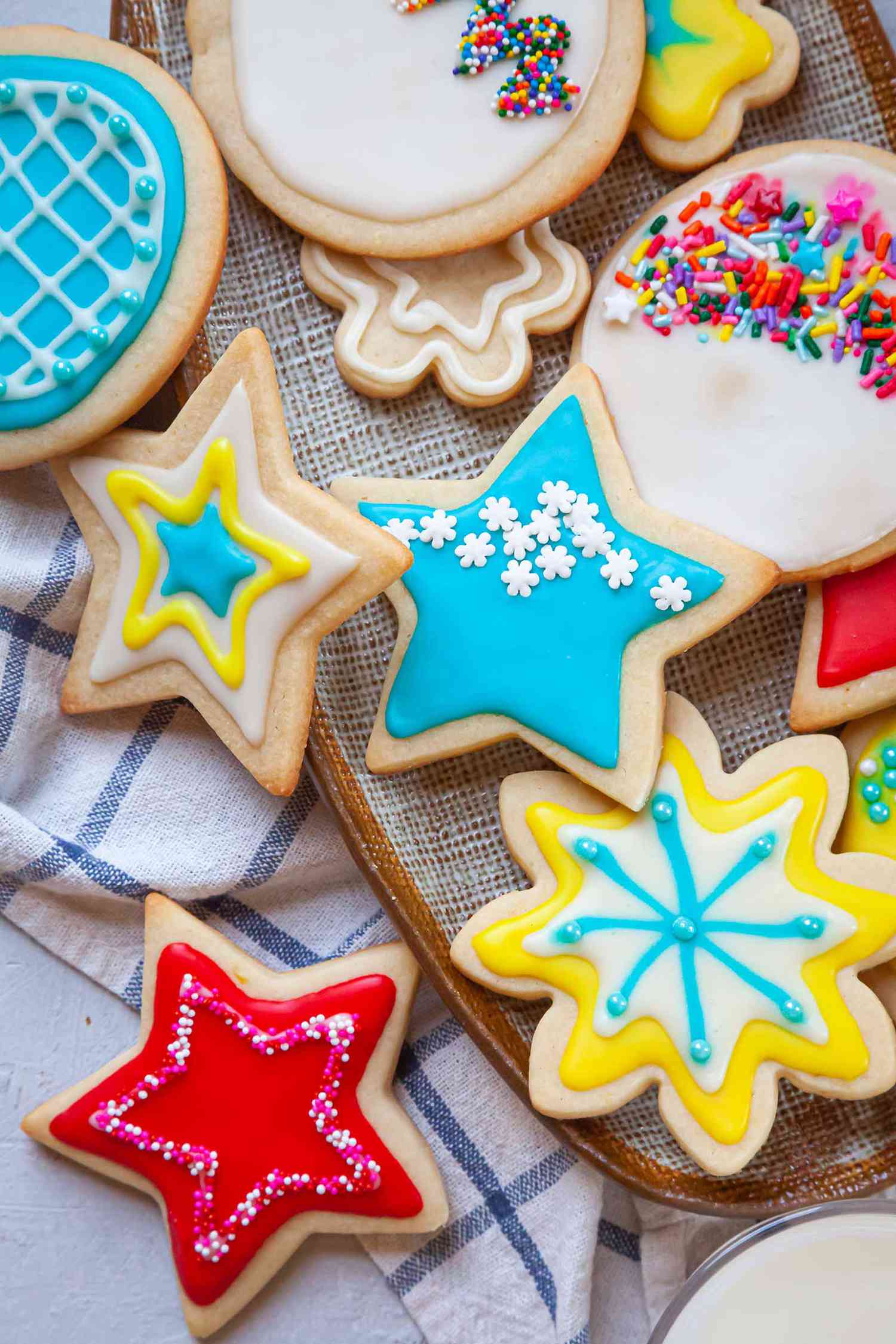 A platter of brightly decorated sugar cookies using an Easy Royal Icing Recipe.