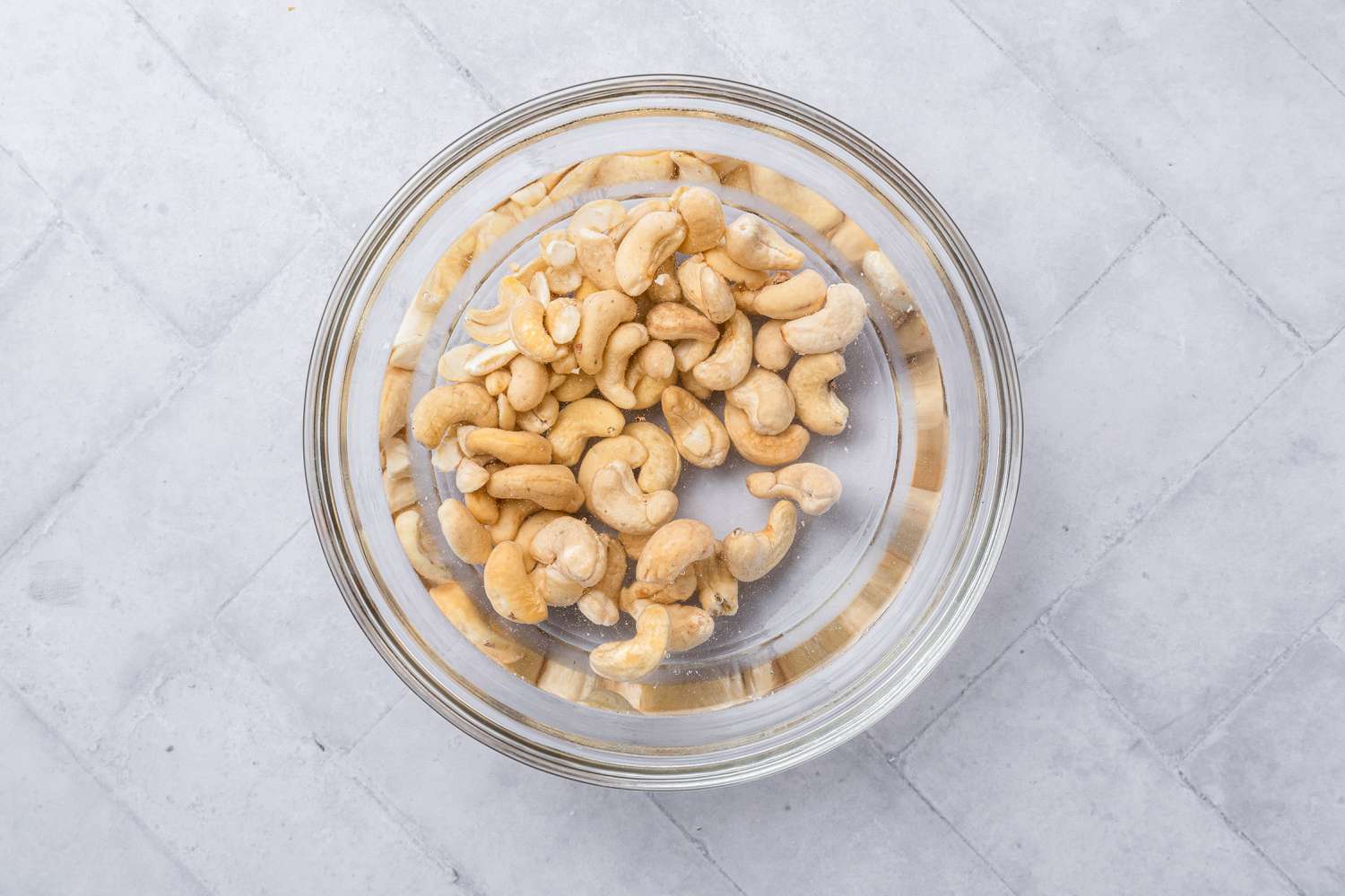 Cashews Soaking in a Bowl of Water for Vegan Mac and Cheese Recipe