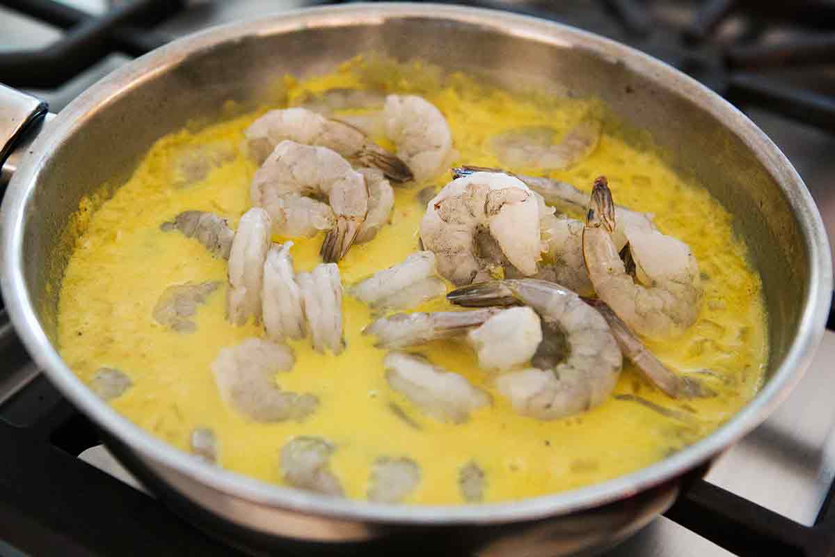 Adding shrimp to shrimp curry