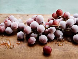 Frozen red grapes on a table