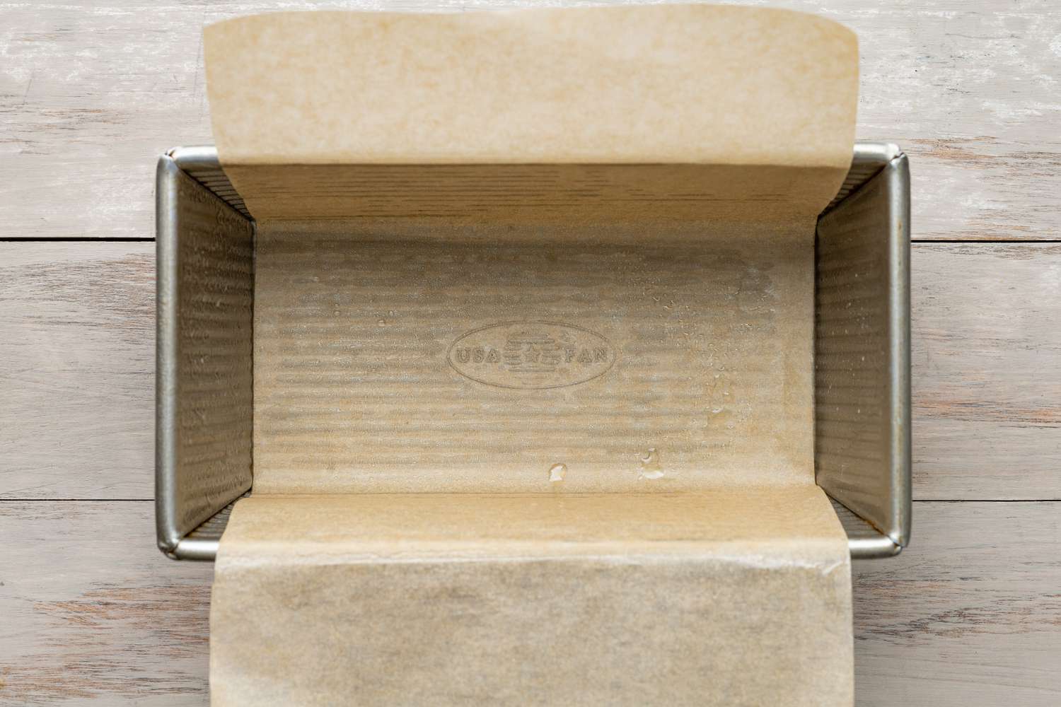 Parchment Paper Lined Bread Pan for Dulce de Leche Banana Bread Recipe