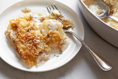 Au Gratin Potatoes on a Plate with a Fork