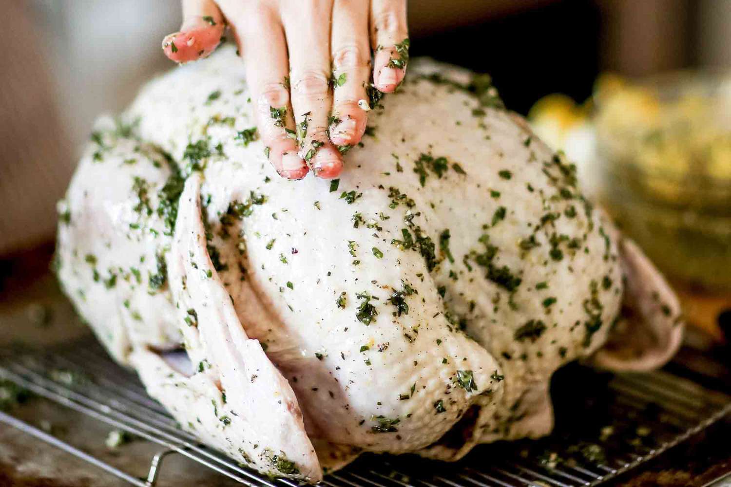 Dry Brined Turkey - rubbing with salt
