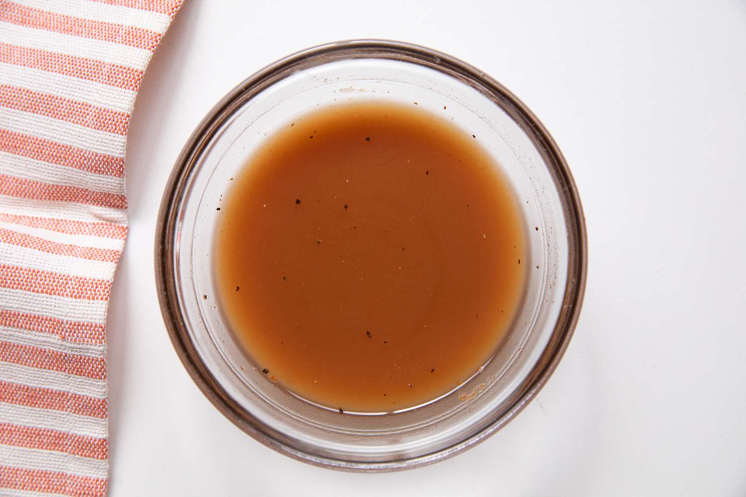 Stock Added to a Bowl of Remaining Marinade for Lok Lak Recipe