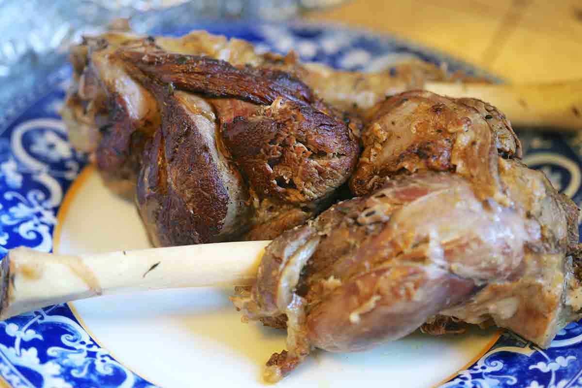 cooked lamb shanks on plate