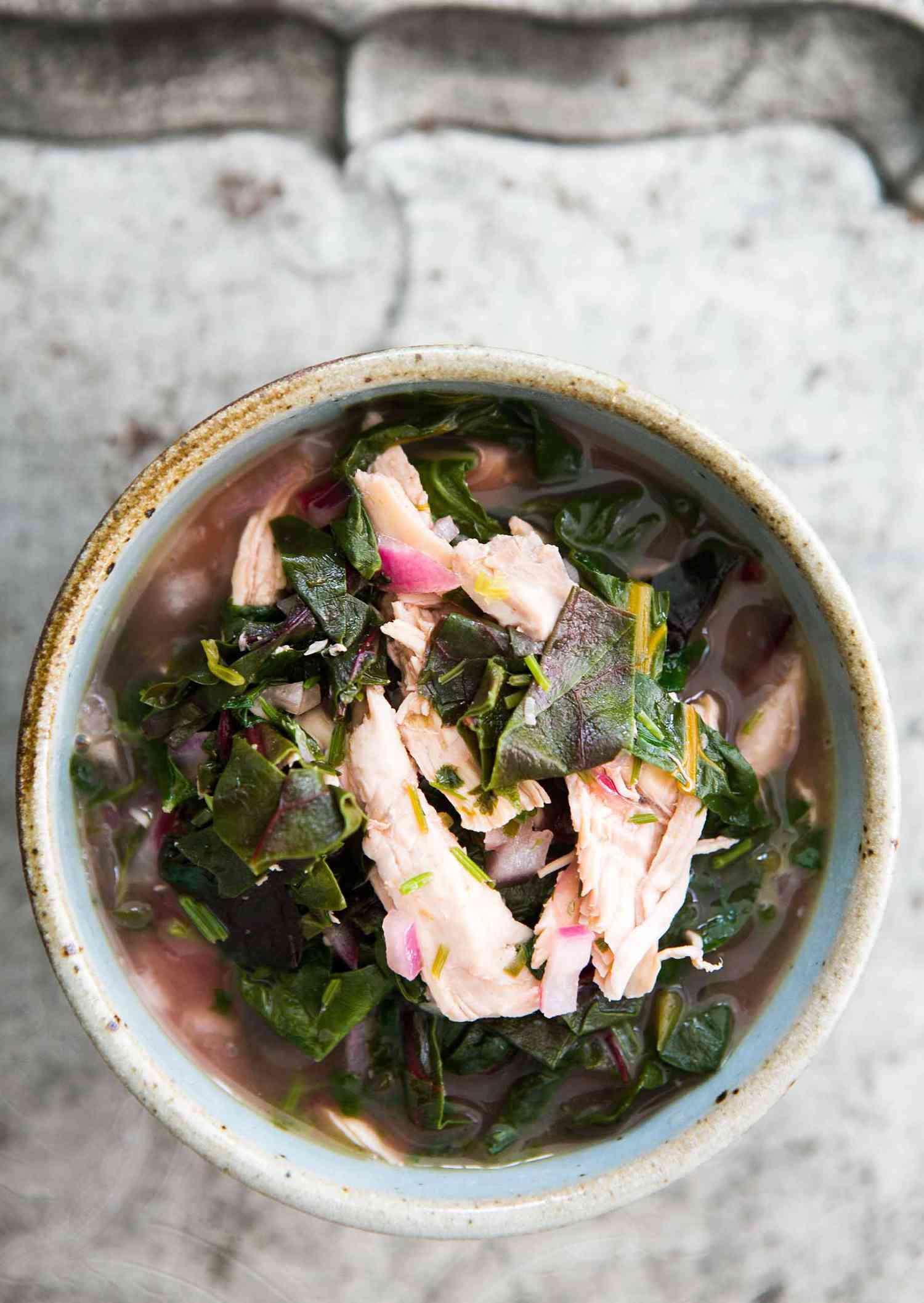 Chicken stew with coriander cilantro and chard