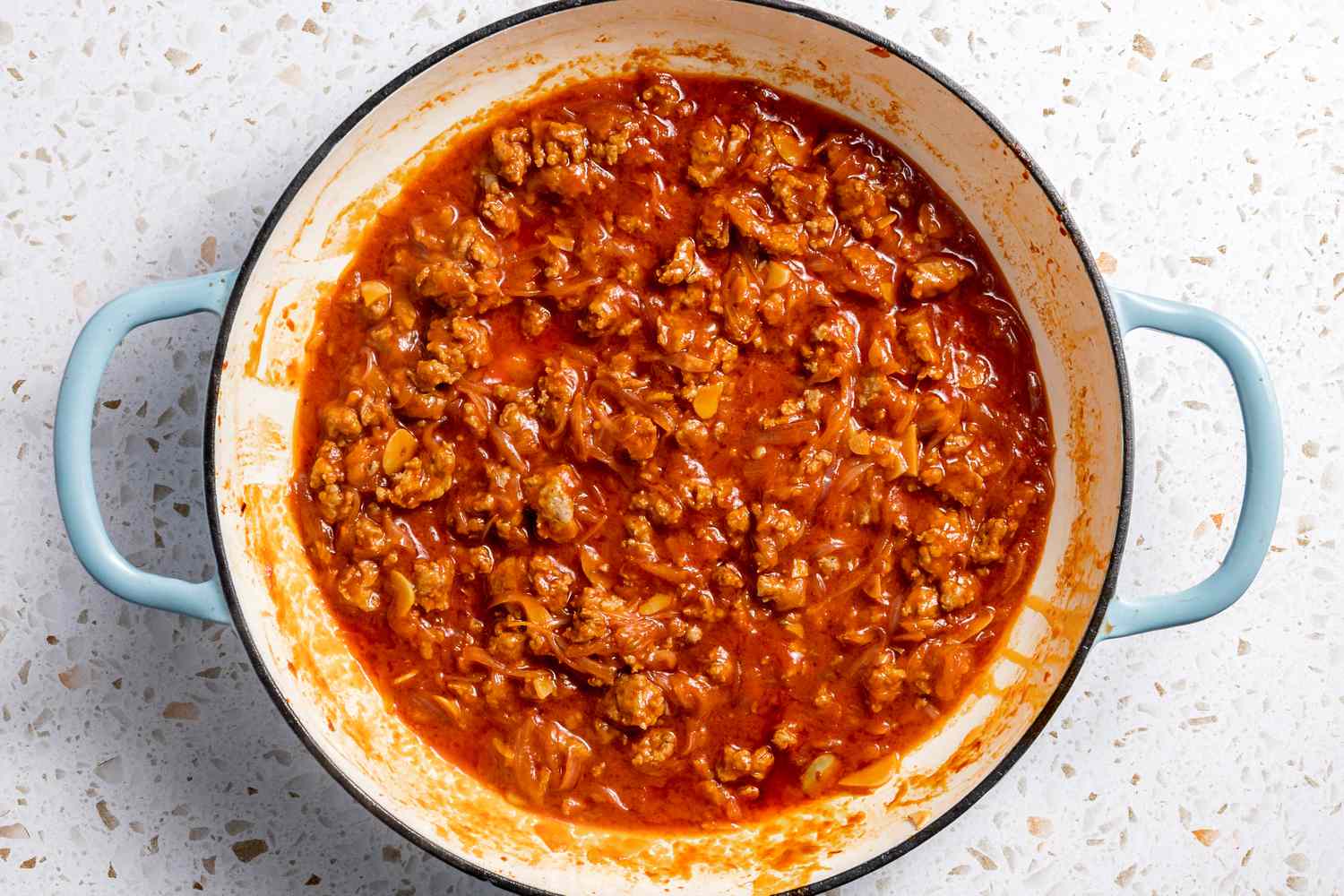 Pasta Water Added to Pan With Ragu