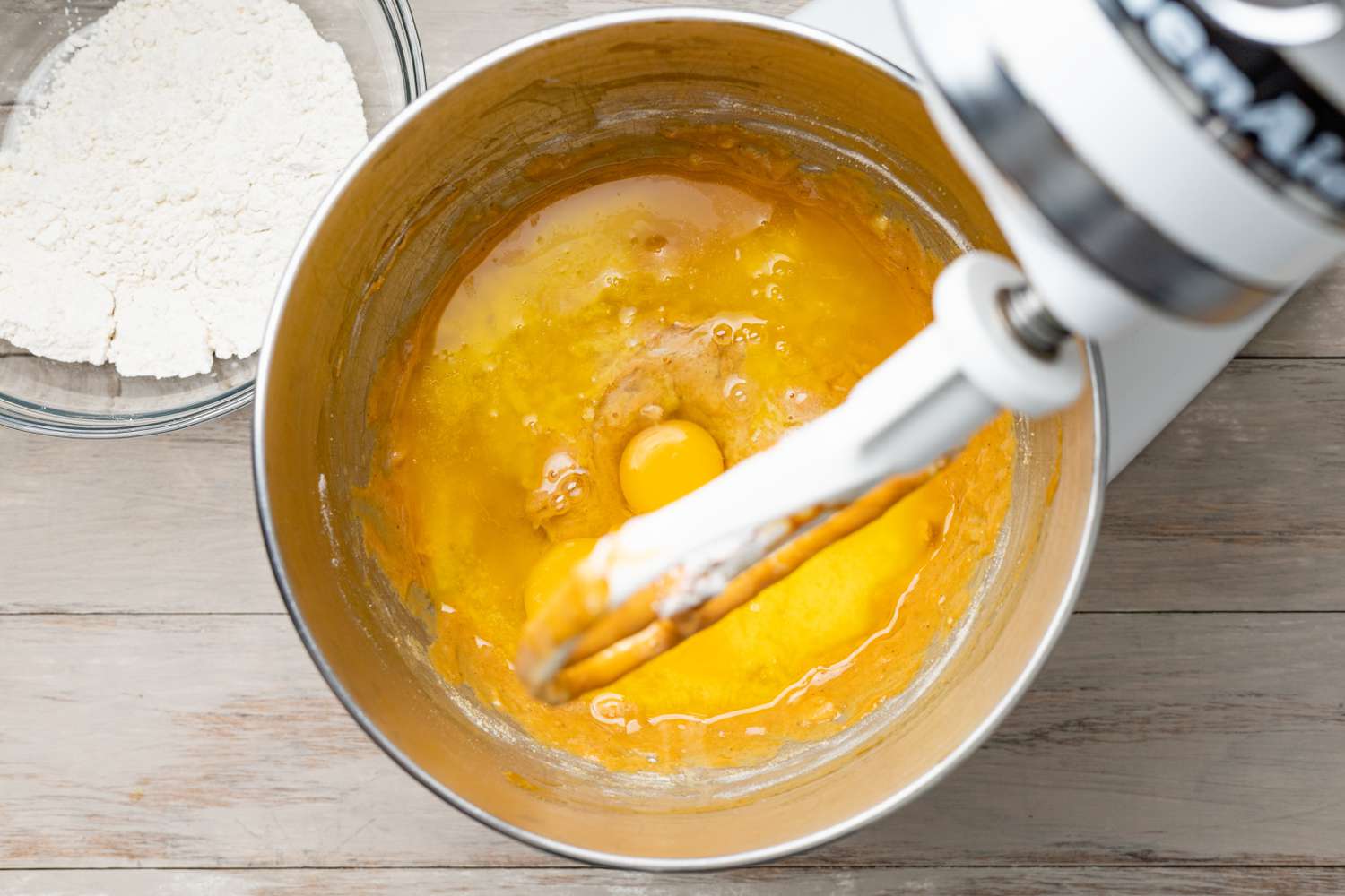 Eggs Added to the Stand Mixer After First Round of Flour for Spiced Dulce de Leche Banana Bread Recipe