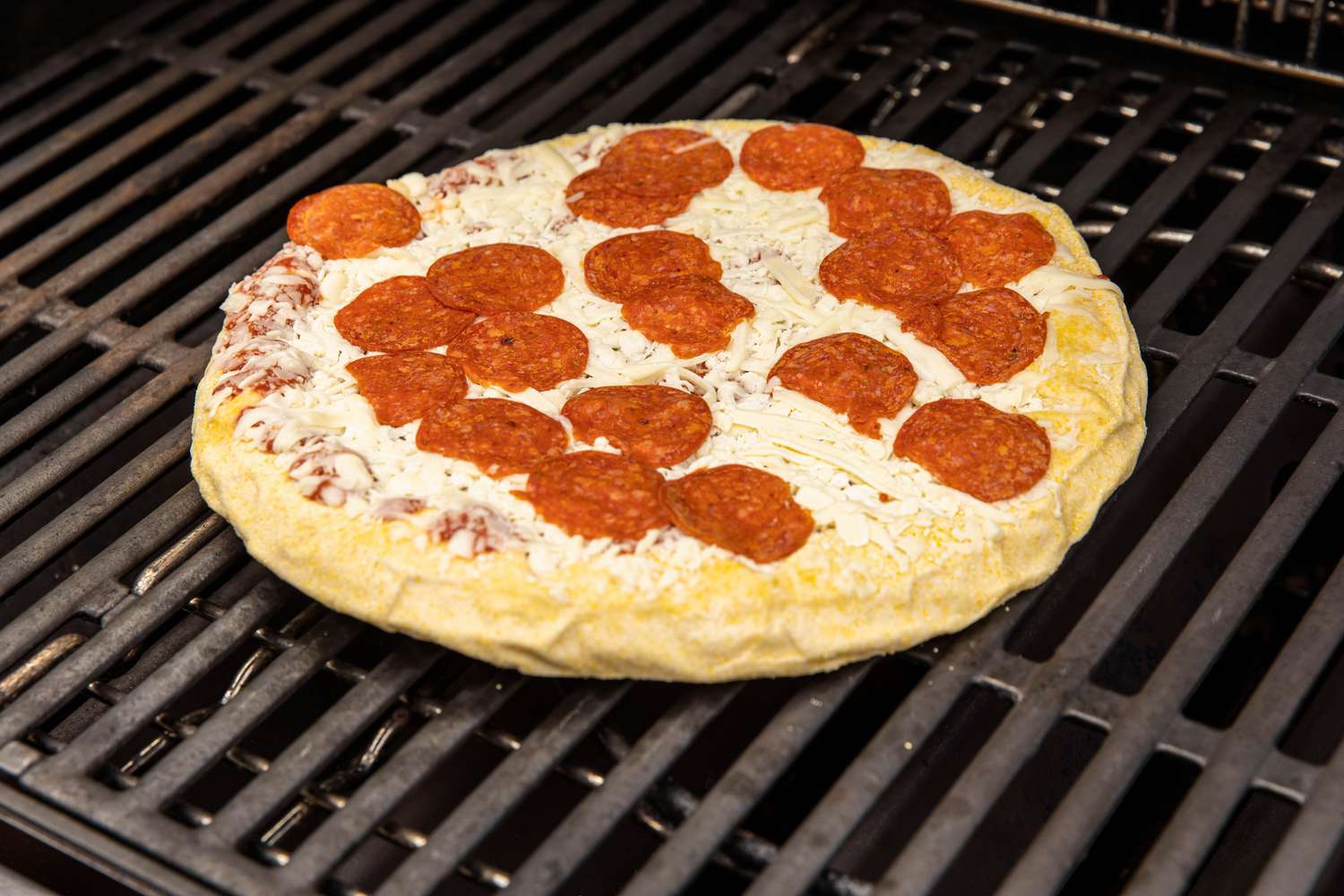 frozen pizza on the grill