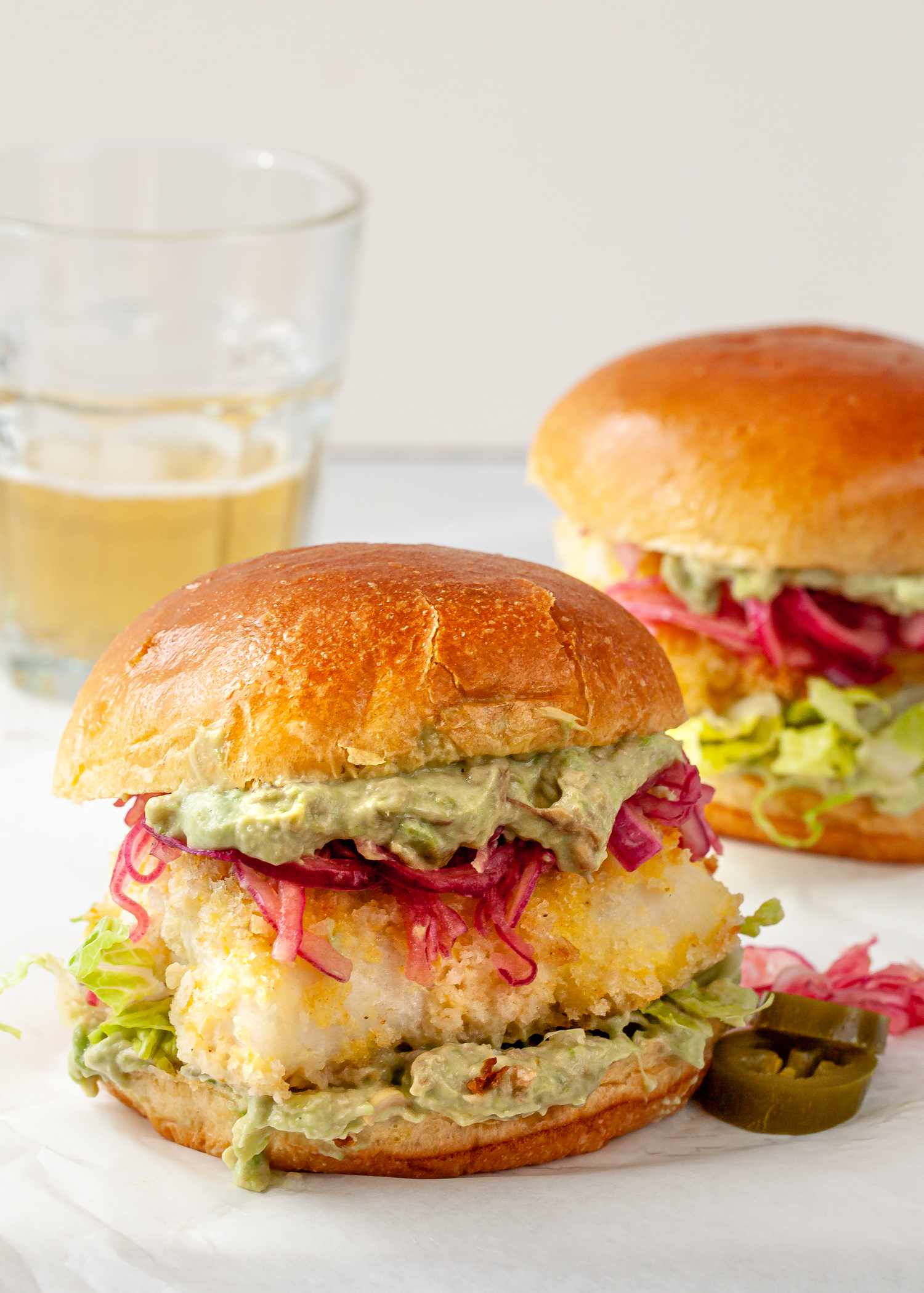 Crispy Oven Baked Fish Sandwiches with Mayo and Tangy Pickled Onions