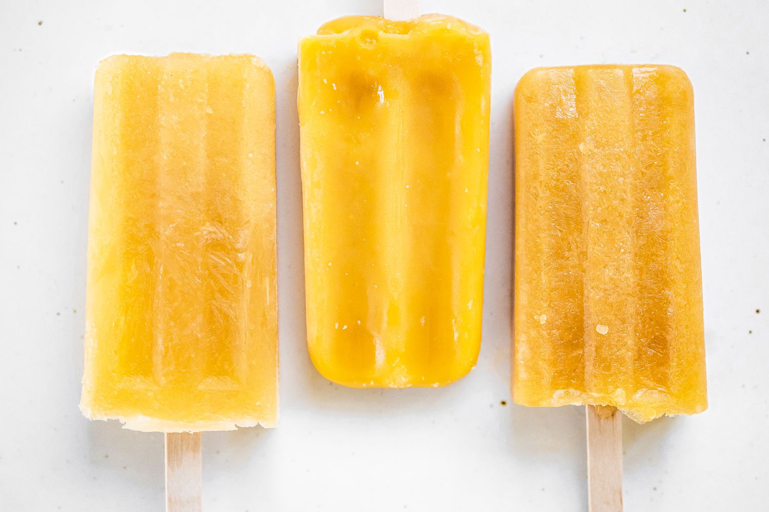 Peach Daiquiri Popsicles on the Counter