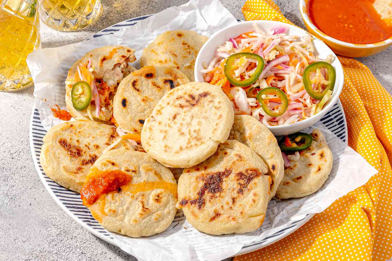 Plate of Pupusas with a Bowl of Curtido