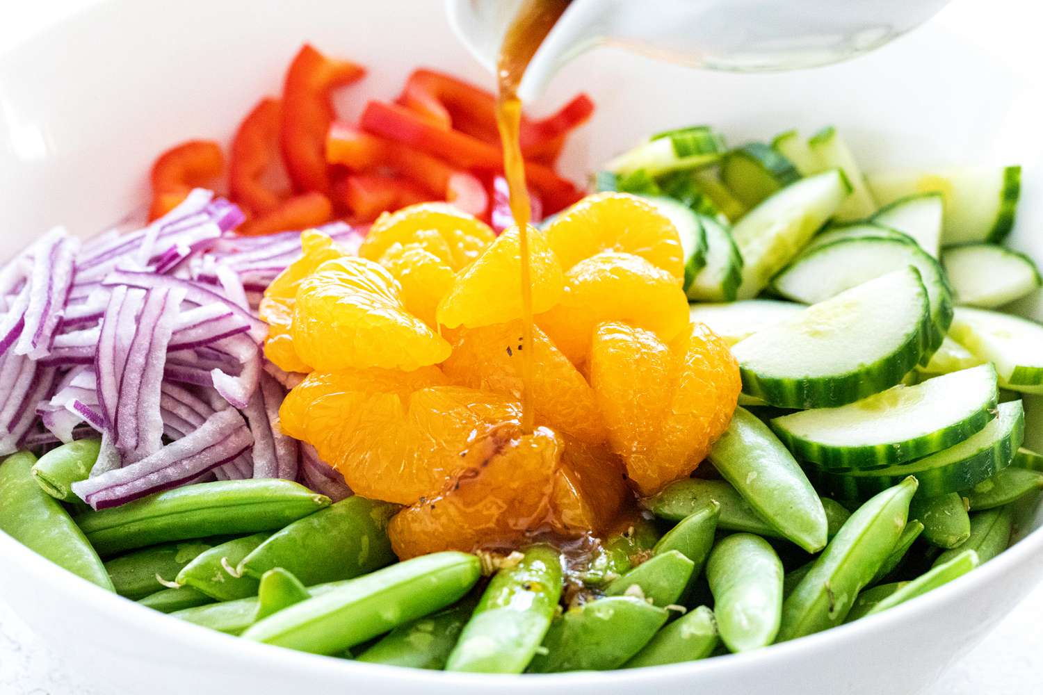 Add dressing to salad.