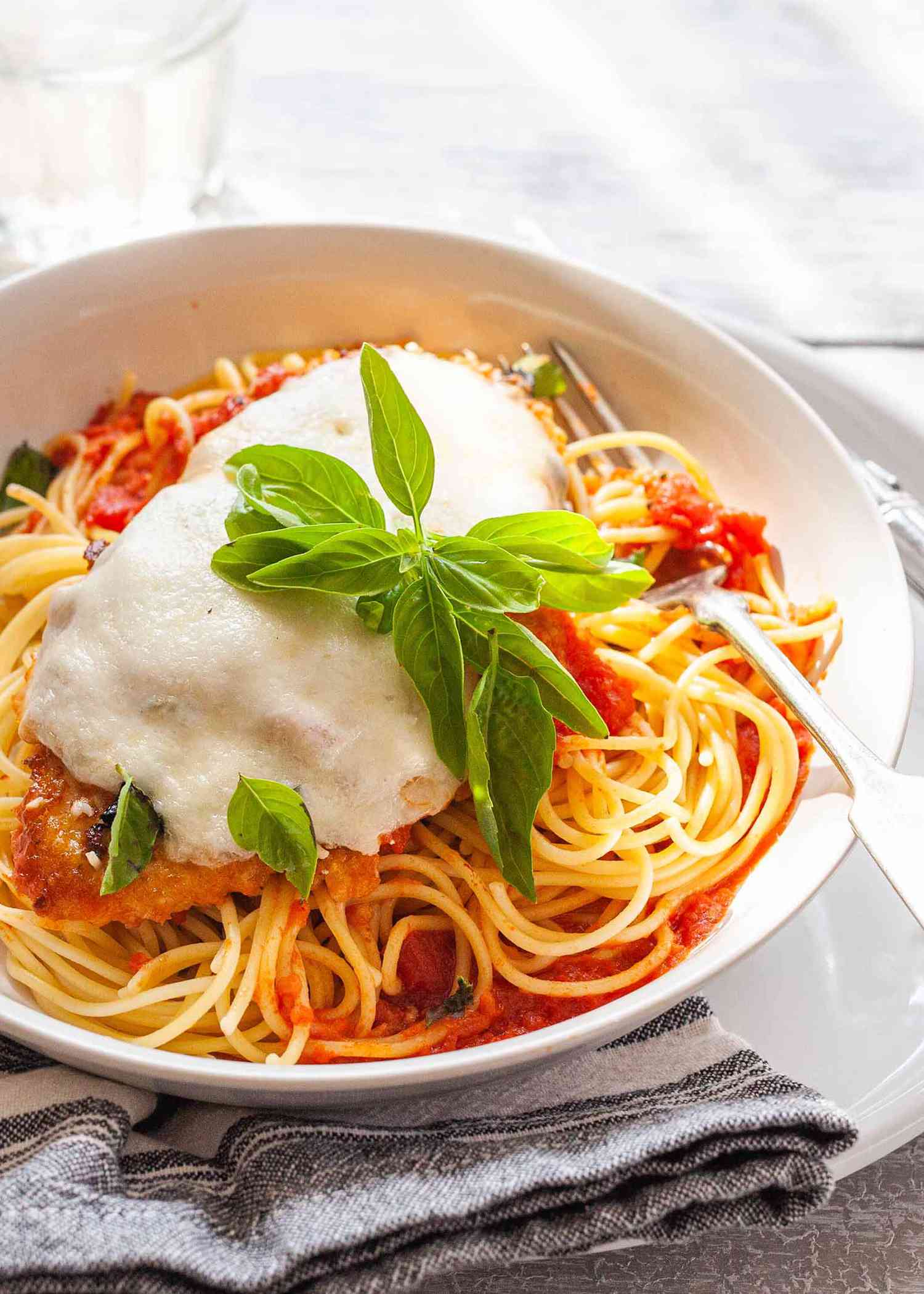 Baked Chicken Parmesan bake the chicken in the oven in a casserole dish