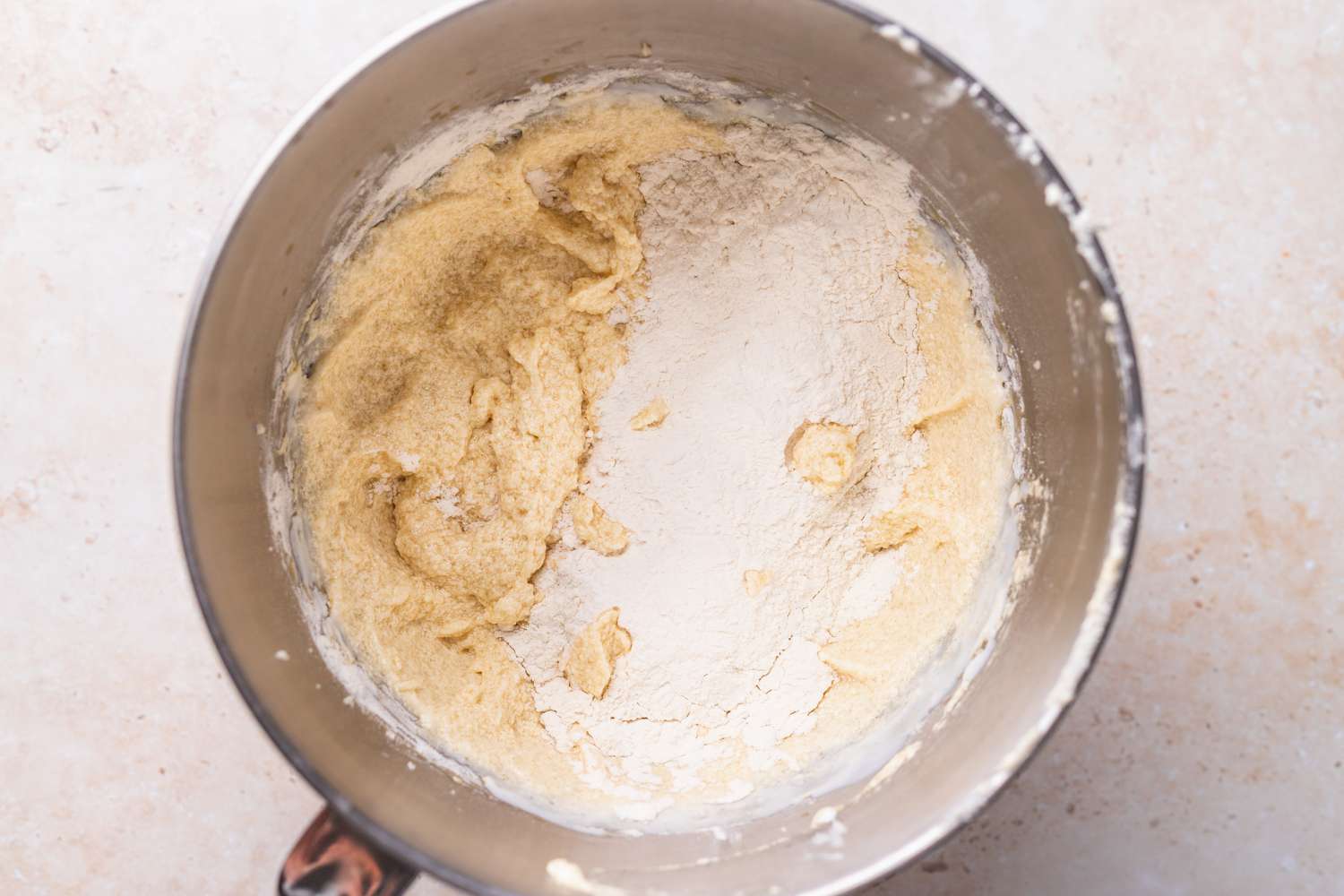 Dry Ingredients Added to Mixing Bowl with Wet Ingredients for Unicorn Cake 