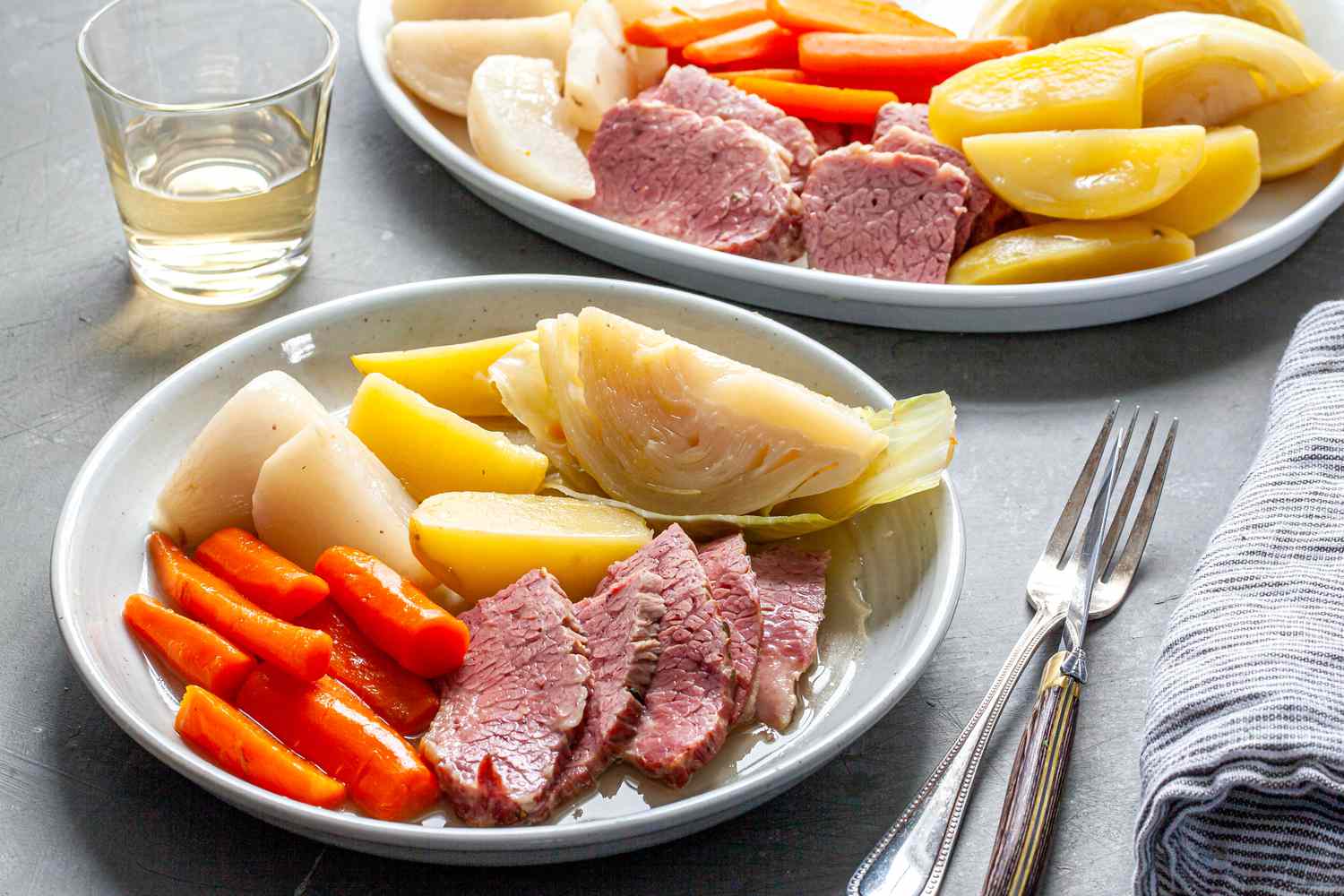 New England Boiled Dinner as a meal with carrots, corned beef, and potatoes