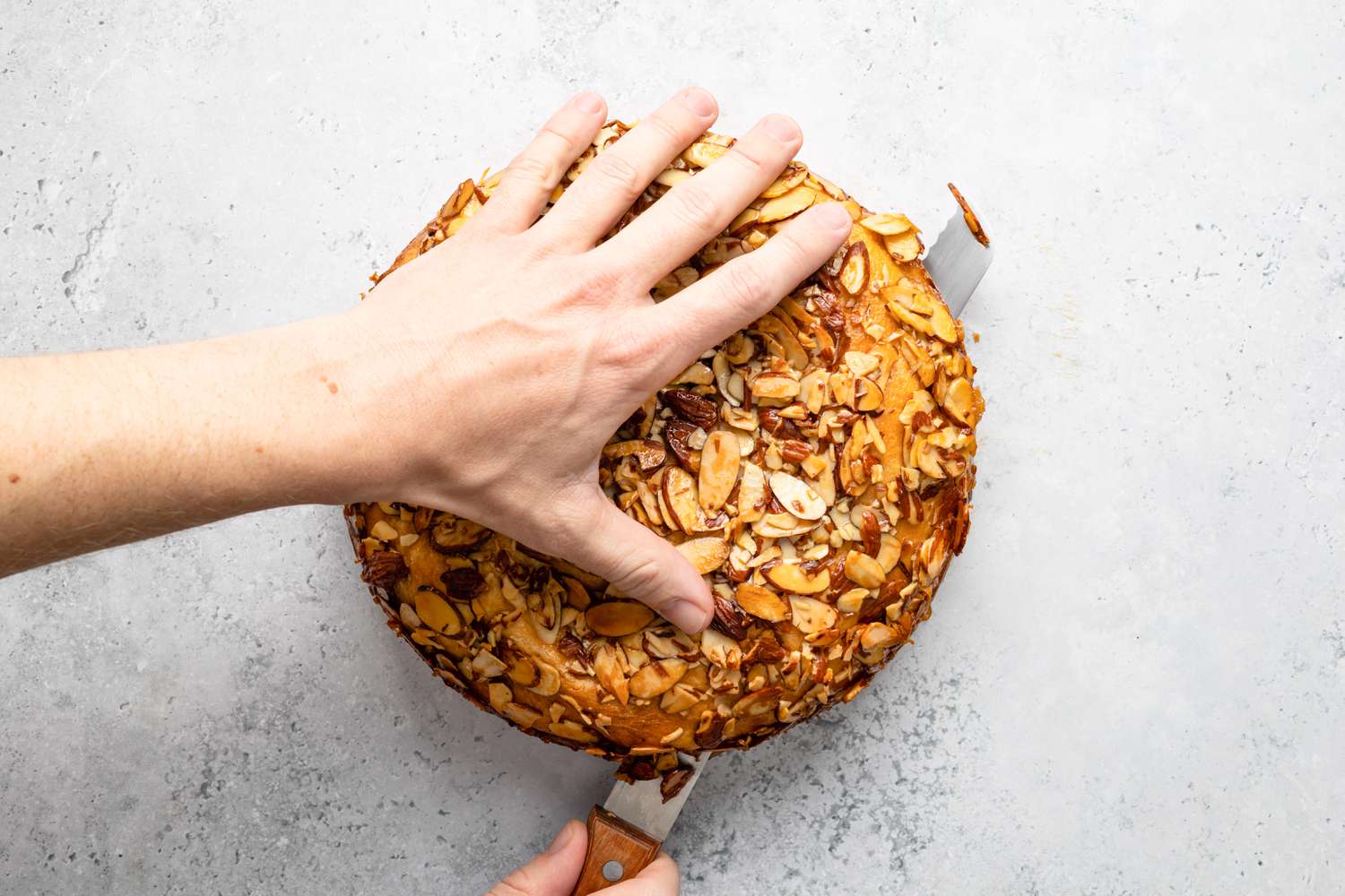 Bee Sting Cake Cut in Half with a Bread Knife