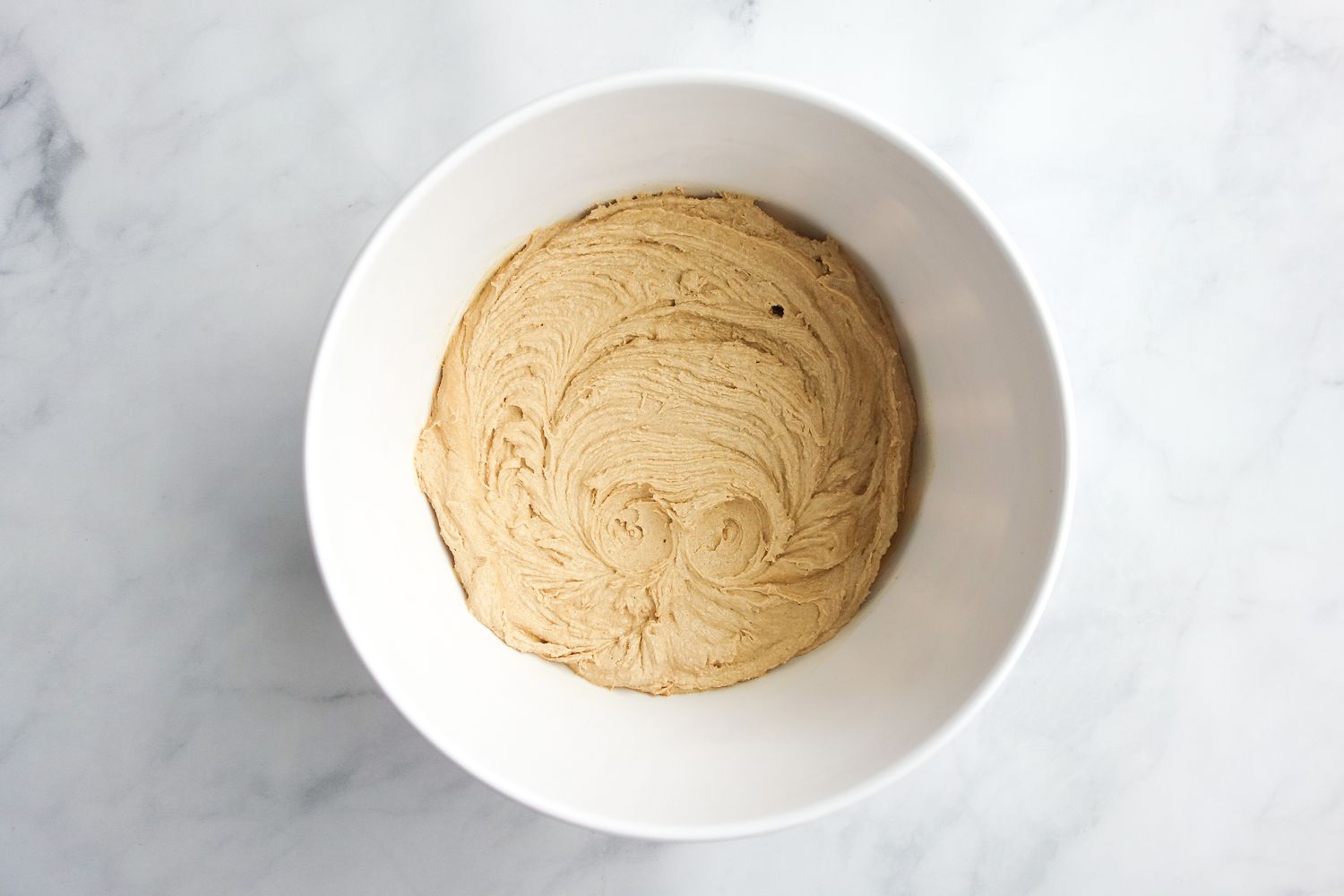 Bowl of Creamed Eggs and Brown Sugar for Peanut Butter Oatmeal Cookies
