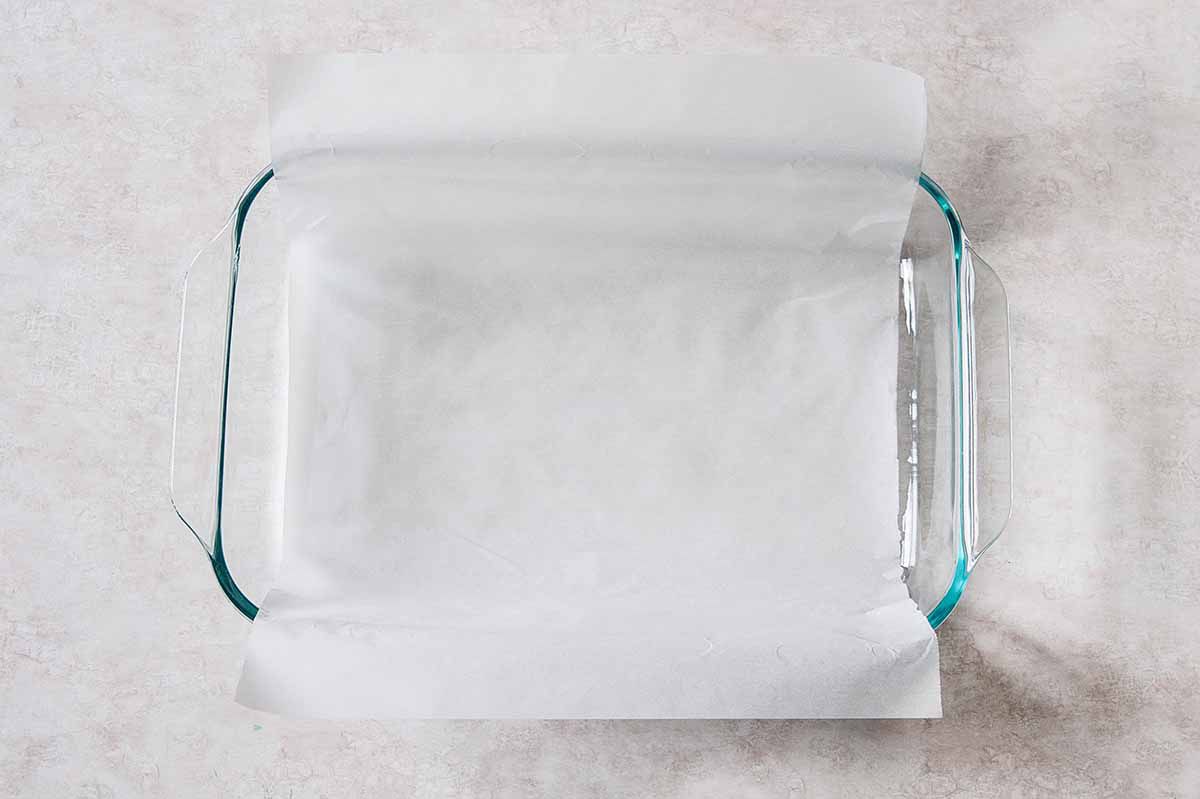 Easy Lemon Bars - parchment-lined baking dish