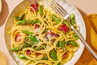 overhead view of a plate of Spring Carbonara with a fork