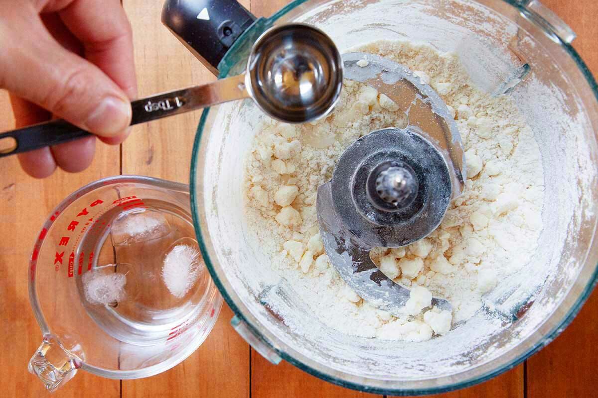Water being added to the best shoofly pie dough.
