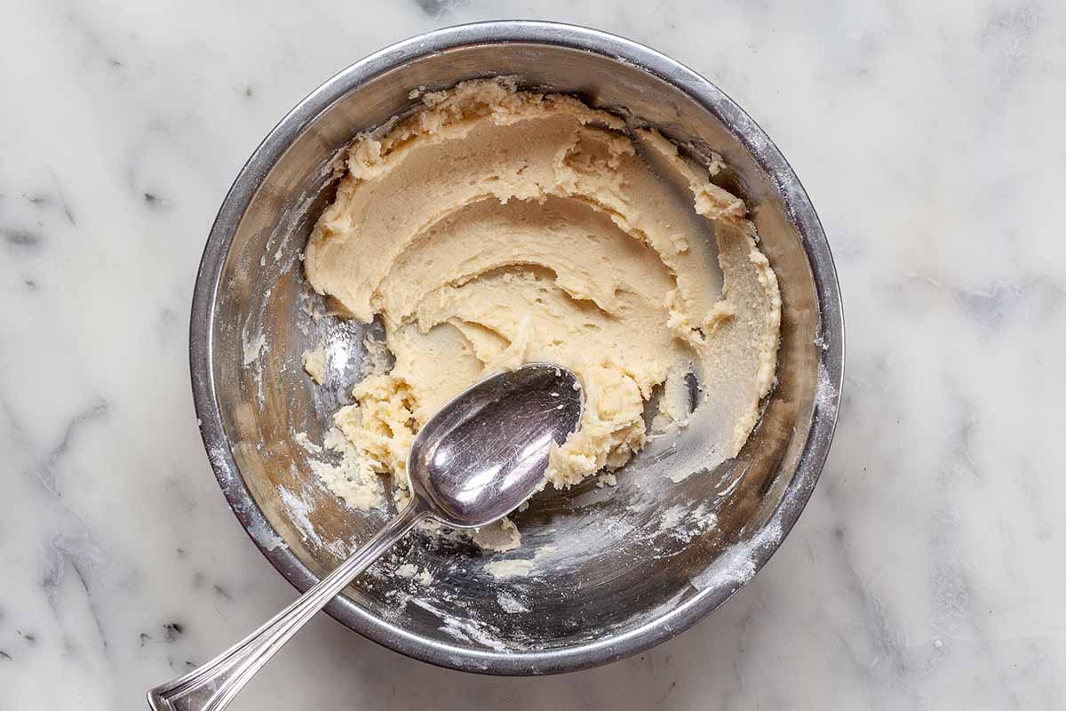 Shepherd’s Pie with Mushrooms -- spoon in bowl with creamy paste known as beurre manié