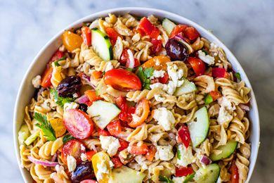 Greek Pasta Salad in a white serving bowl