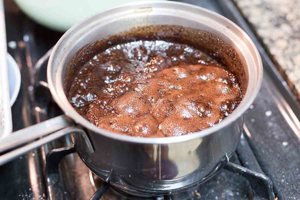 No bake cookies simmering on the stove to show how to make no bake cookies.