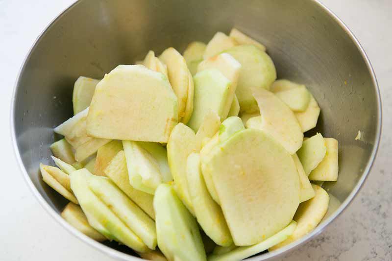 sliced apples in a bowl for apple crostata