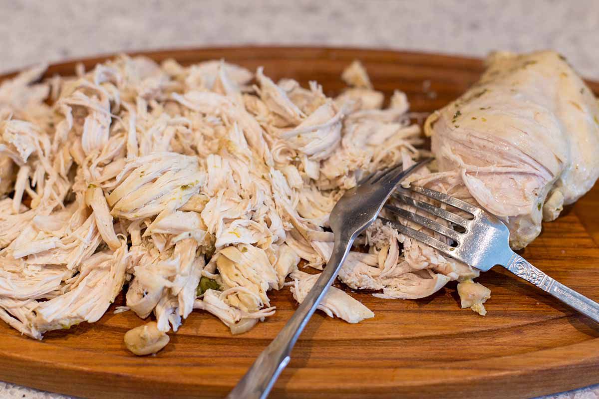 Creamy White Chicken Chili shred the chicken