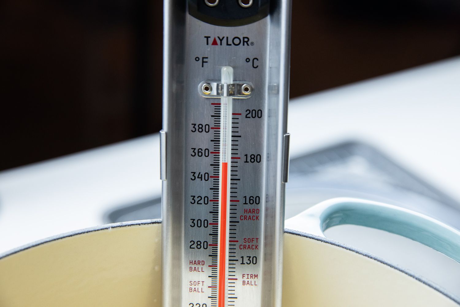 Thermometer in a Dutch Oven with Hot Oil for How to Deep Fry
